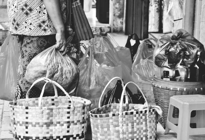 Lady with her baskets. Medan, Indonesia. © Preet Kaur 2013