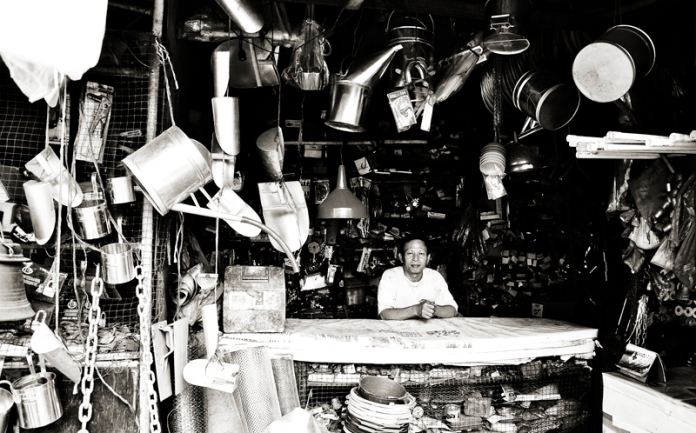 Man in hardware store. Medan, Indonesia. © Preet Kaur 2013